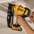 Dewalt DCN660N 18V XR Brushless Second Fix Finishing Angled Nail Gun, 2500x 32mm 16g 20° Angled Brad Nails & 24’’ Large Duffel Tool Bag image D