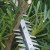 Makita UN001GZ 40V XGT Brushless Pole Hedge Trimmer, 1x 2.5Ah Battery & Charger image B