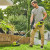 Ryobi 2 Piece 18V ONE+ Lawn Mower & Grass Trimmer Garden Power Tool Starter Kit With 4.0Ah Battery & Charger image M