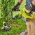 Ryobi 2 Piece 18V ONE+ Lawn Mower & Grass Trimmer Garden Power Tool Starter Kit With 4.0Ah Battery & Charger image K