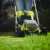 Ryobi 2 Piece 18V ONE+ Lawn Mower & Grass Trimmer Garden Power Tool Starter Kit With 4.0Ah Battery & Charger image B