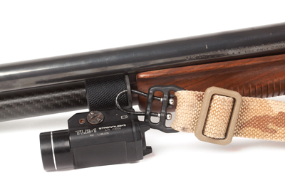 Remington 870 long barrel with uloop hardware attached to sling