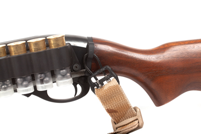 Remington 870 uloop hardware attached to stock of shotgun