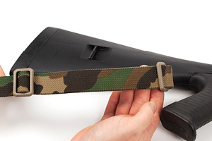 Sling Attachment to Benelli Stock without Adapters Step one Take rear of sling and unthread triglides for step tw