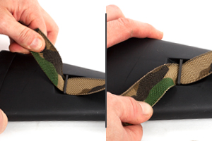 Sling Attachment to Benelli Stock without Adapters Step Four Tug back and forth to slowly move webbing through