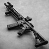 Arisaka Vertical Grip M-LOK installed on tactical AR-style rifle platform