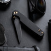 Toor Knives Suitor FL154S Shadow Black folding knife with CPM 154 blade and titanium handle