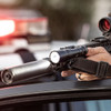 SureFire M340DFT-PRO Turbo Mini Scout Light Pro mounted on rifle with suppressor