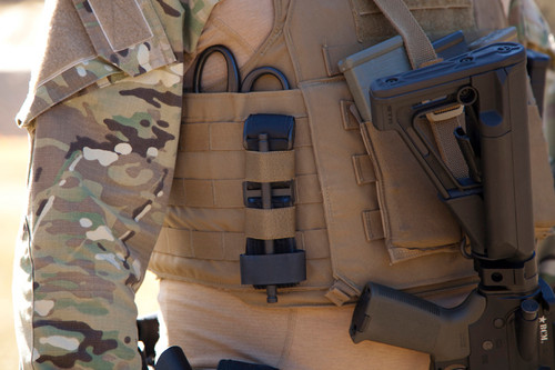 Tourniquet NOW! Strap on side of plate carrier