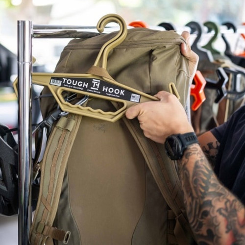Heavy-duty Tough Hook Hanger with reinforced I-beam design, wide shoulders, and built-in handle for tactical gear storage.