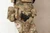 Small molle pouch next to holster
