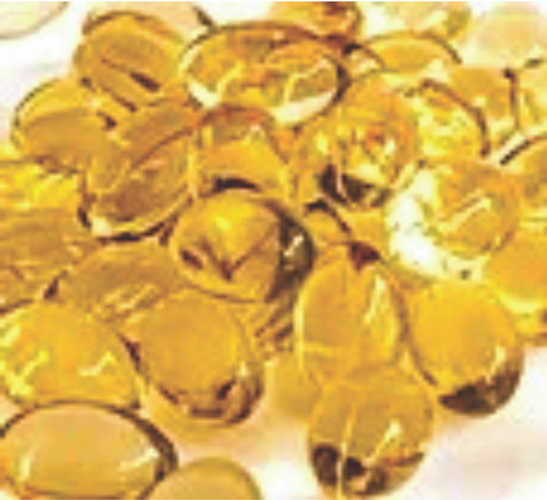 Picture of numerous transparent yellow soft gels.