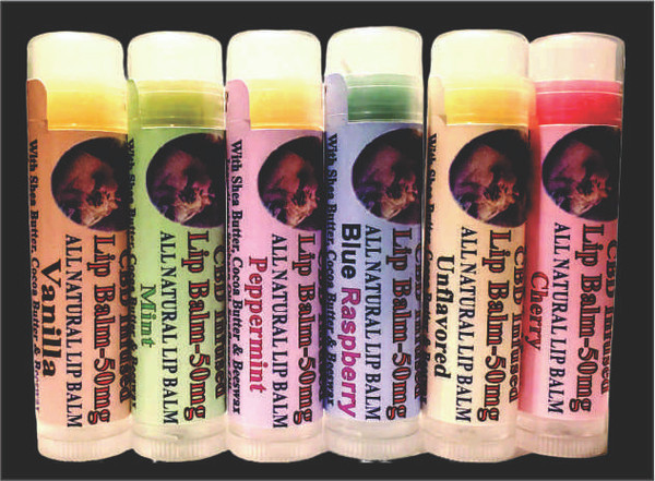 six lip balms lined up side by side to show the different flavors of Pearl's Gold CBD lip balm