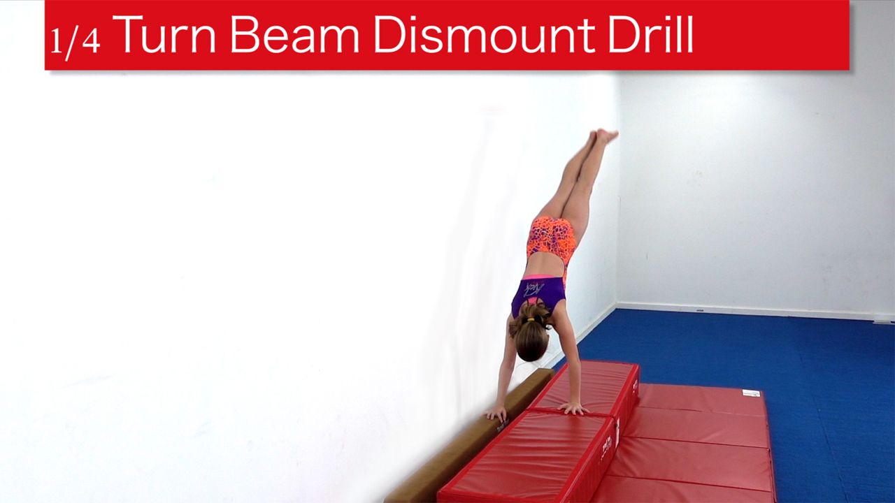 Play Video - 1/4 Turn Beam Dismount Drill