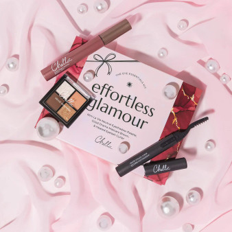 Elevate your holiday look with our "Effortless Glamour" Eye Essentials Kit. Includes the Mini La Vie Neutral Eyeshadow Palette, Good Drama Mascara Brown, and our Heated Eyelash Curler, all in a reusable gift box.