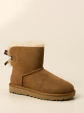 UGG – Winterboots aus Lammfell und Veloursleder braun