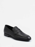 Tod's - Slipper aus geprägtes Leder in schwarz