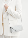 Konstantin Starke – Clutch aus Metallic-Textil silber