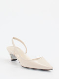 Konstantin Starke – Slingpumps aus Hochglanzleder beige