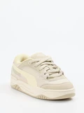 Puma – Sneaker aus Veloursleder Beige
