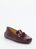 Tod's – Loafer aus Hochglanzleder in Bordeaux