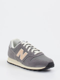 New Balance – Sneaker aus Textil und Veloursleder grau