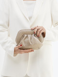 Konstantin Starke – Abendtasche aus Leder goldfarben
