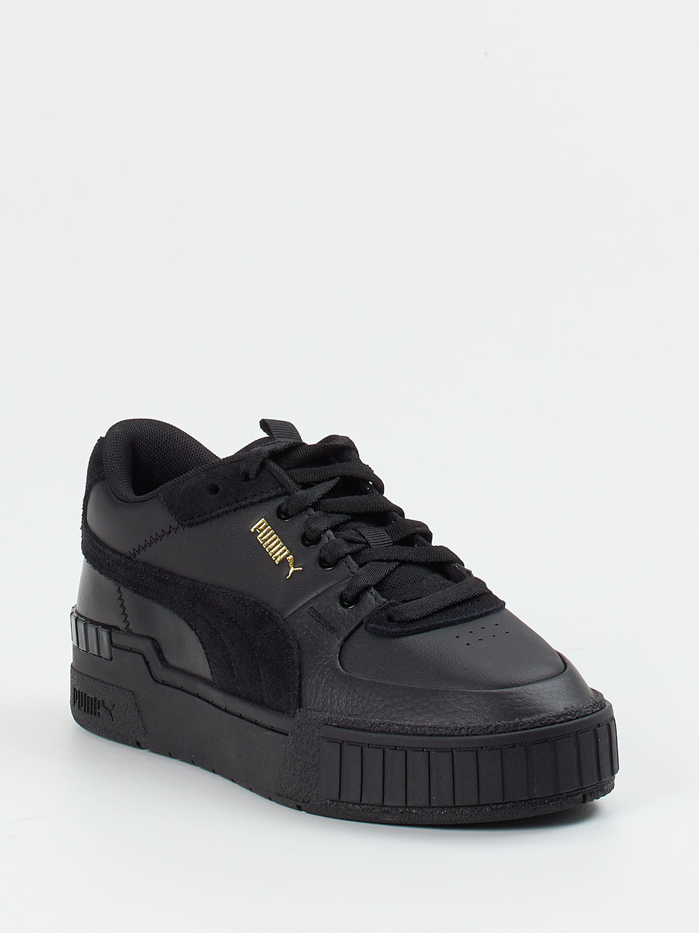 Puma – Sneaker aus Leder in Schwarz mit Goldakzenten