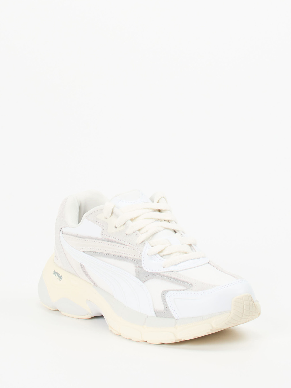 Puma – Chunky Sneaker aus Textil und Wildleder Offwhite