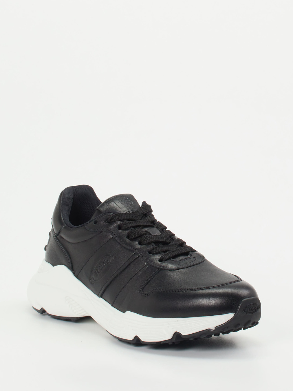 Tod's – Sneaker aus Kalbleder in Schwarz-Weiß