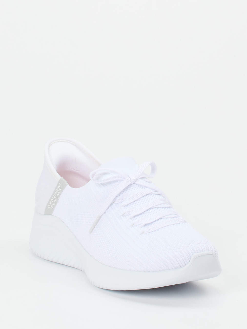 Skechers – Slip-On Sneaker aus Textil in Weiß