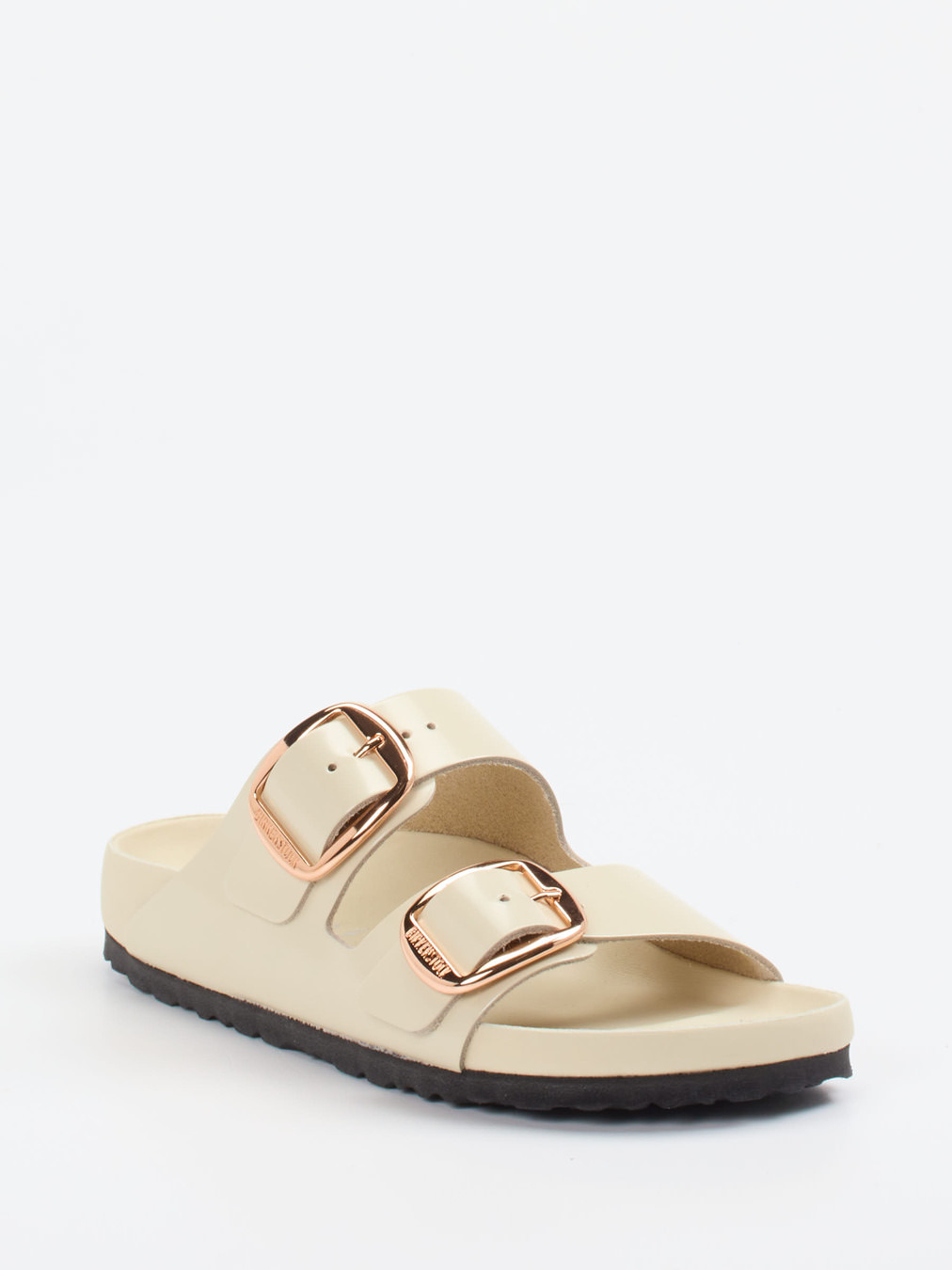 Birkenstock – Zweiriemer-Sandale aus Hochglanzleder Creme