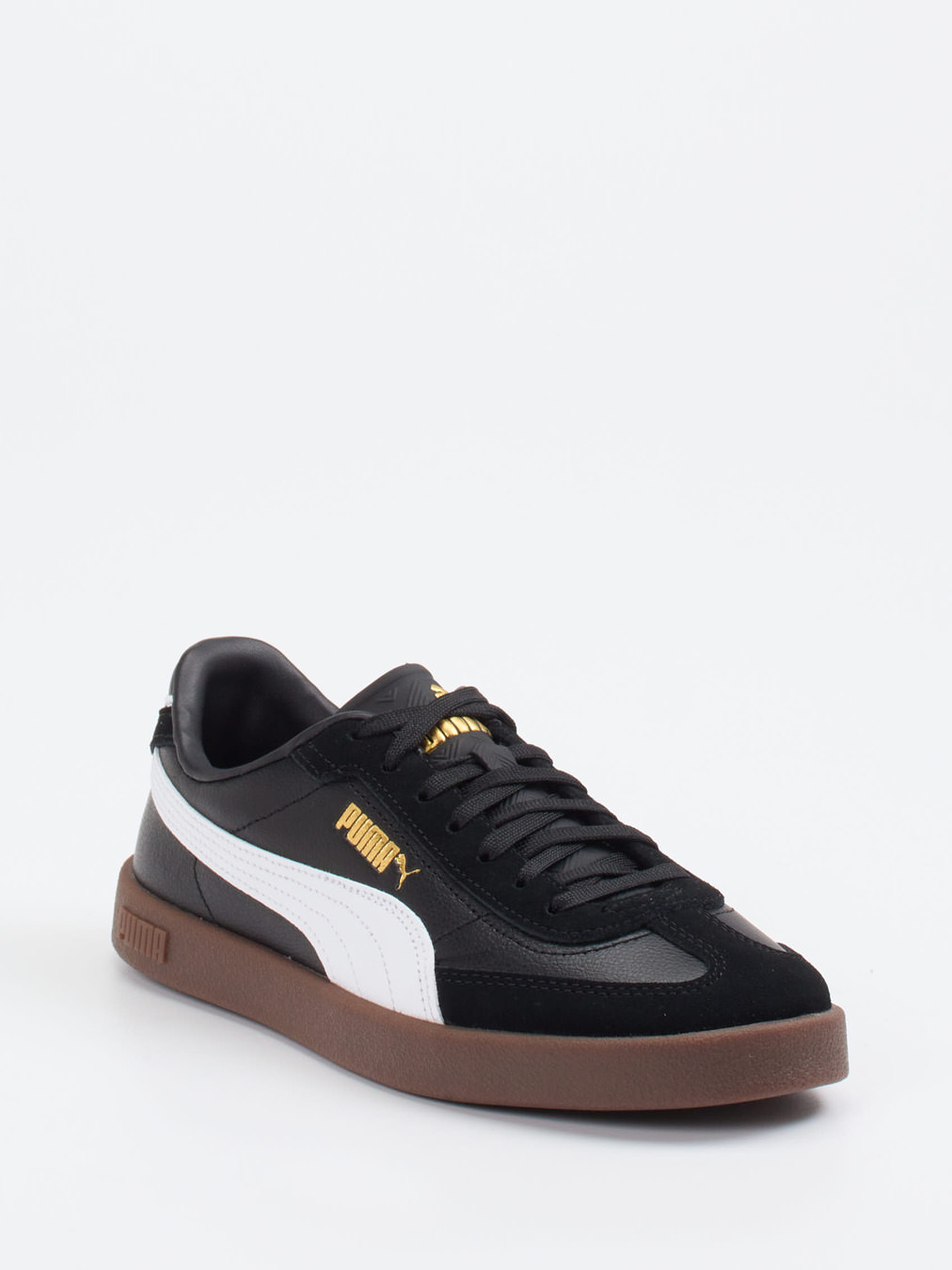 Puma – Sneaker aus Leder in Schwarz mit Gumsohle