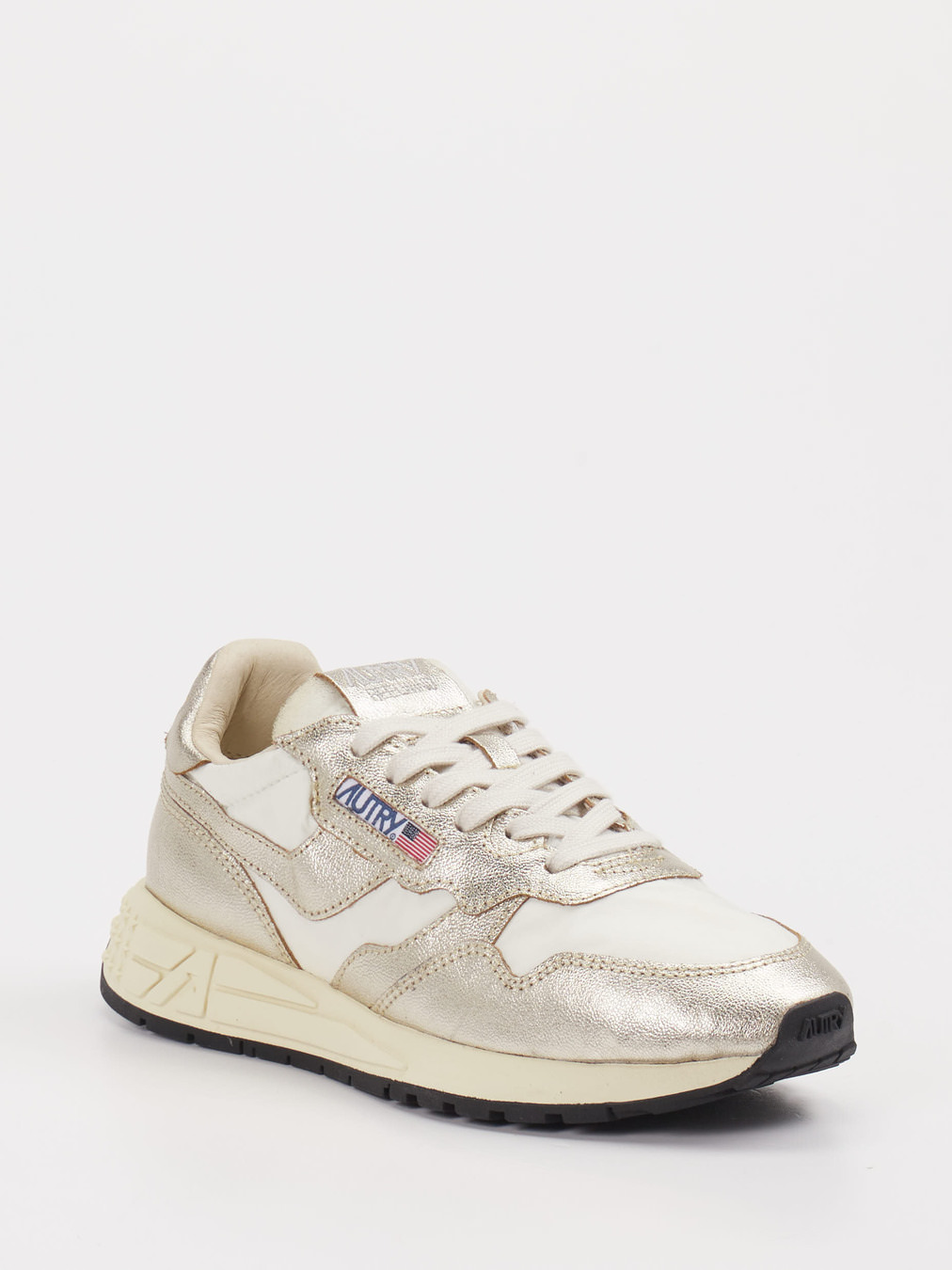 Autry – Sneaker aus Metallic-Leder in Beige-Gold