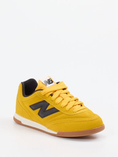New Balance – Sneaker aus Veloursleder Senfgelb