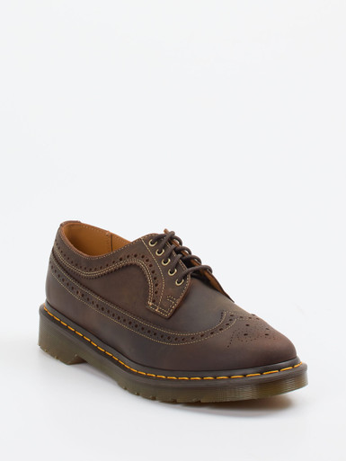 Dr. Martens – Brogues aus Leder in Dunkelbraun