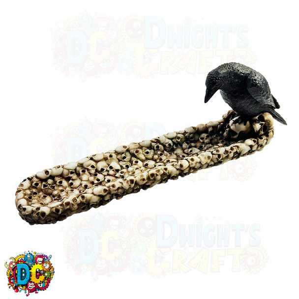 Raven on a bed of skulls incense stick burner