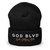 GOD BLVD - Victory - Black Cuffed Beanie - White/Old Gold Embroidered
