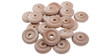 A pile of 1 1/4" wooden toy wheels showing the faced side up.