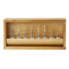 The 8 PC Solid Carbide Ball Nose Set is shown in a wooden case with spacers between  the bit and the hole.