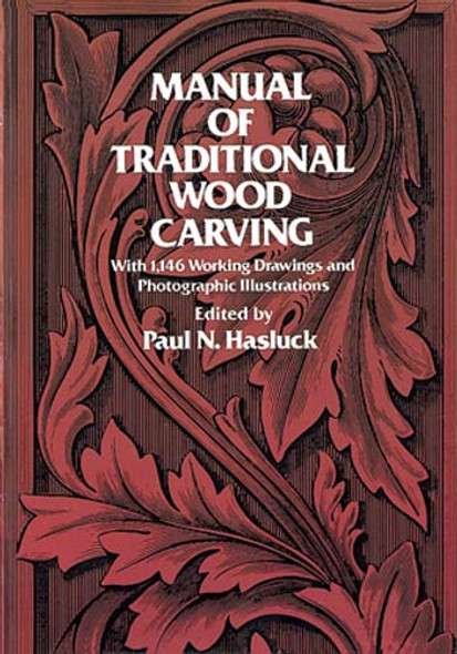 Manual Of Traditional Wood Carving showing the cover of this amazing woodcarving book.