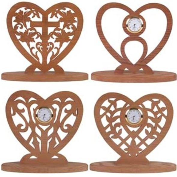 Featuring the finished scroll saw cut outs with four different heart designs and clock inserts.
