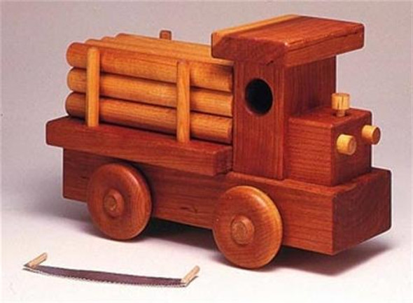 A completed wooden model of a truck when using our Log Truck Toy Woodworking  Plan.