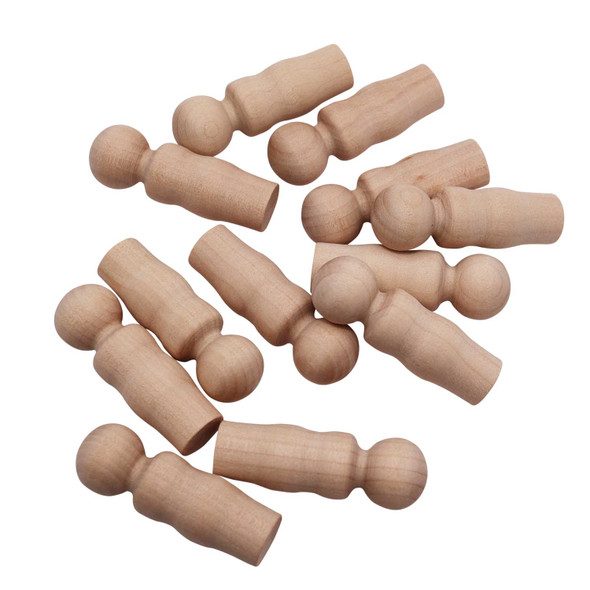 A pile of female figure wood toy parts.