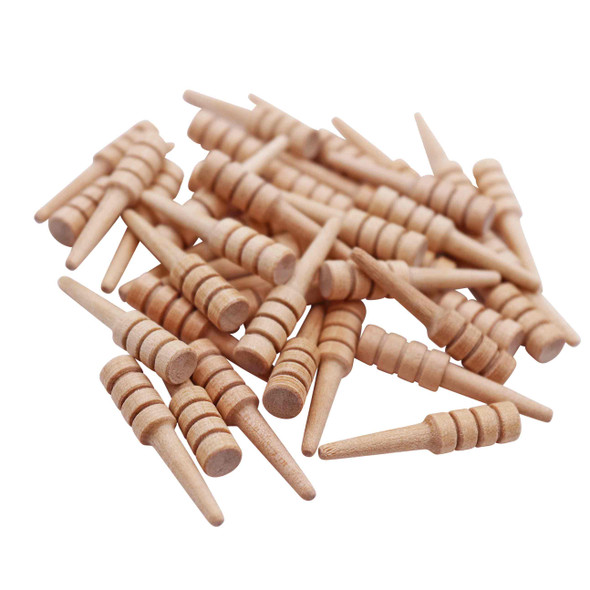 A group of cribbage pegs in a pile.