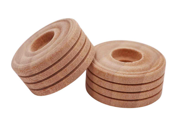 A pair of wooden wheels with tire treads.
