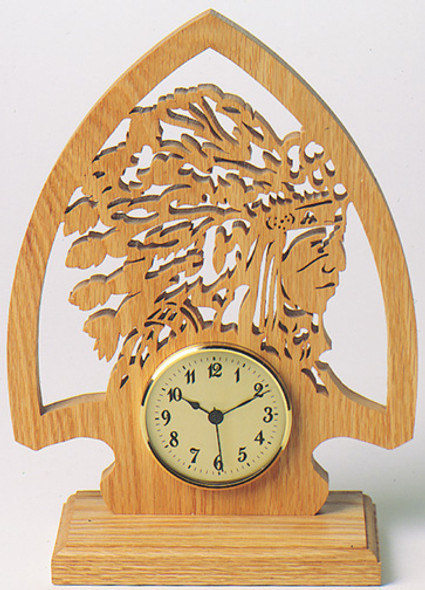 A finished piece of oak with the Arrowhead Clock scroll saw pattern cut out.
