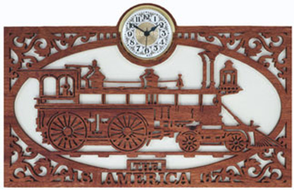 Finished America Train Scroll Saw Clock made from cherry with the words America 1867 scrolled on the bottom of the frame and a clock insert on the top .