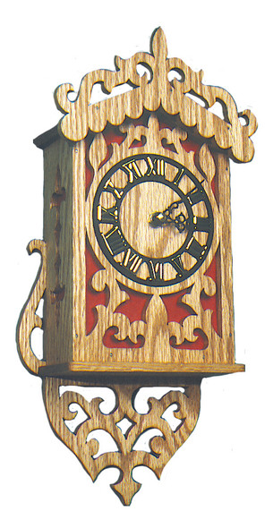 Look at this scroll saw wall clock with embellishments on the top and bottom, with Roman numerals on the dial and red plastiglass bordering the clock. 