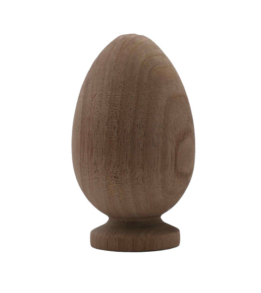 A butternut goose egg on an attached pedestal.